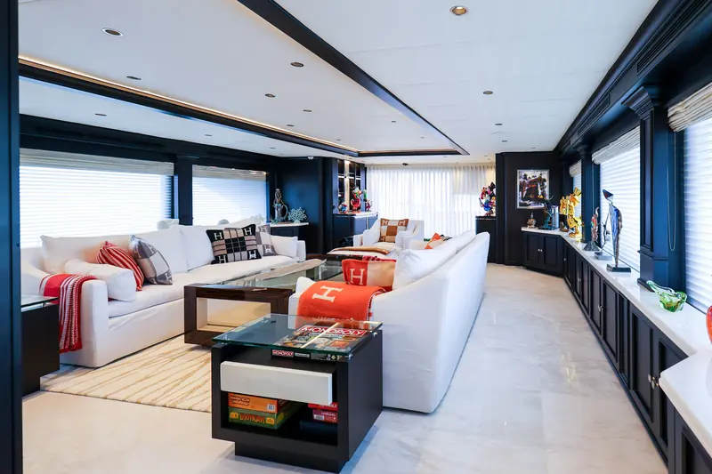 A second saloon seating area with the new furniture the refit specified throughout the interior.