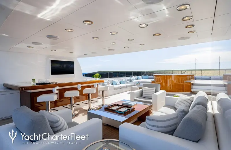 The covered aft saloon extension opens straight onto the aft deck for indoor-outdoor living.