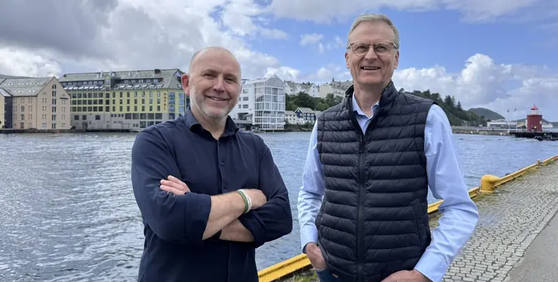 Two of the people behind the deal, photographed on the quay at Vard's home port of Alesund, Norway, where the Norwegian yard outfits both hulls after their steel is built in Romania.