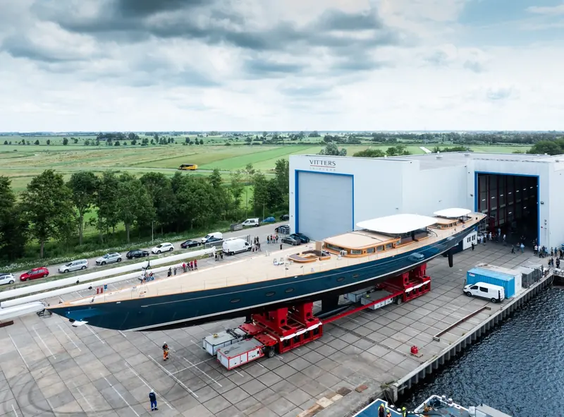From the air: the 69-metre hull dwarfs the yard buildings behind it. Vitters has four other superyachts under construction alongside a seven-year build no other yard would take on.