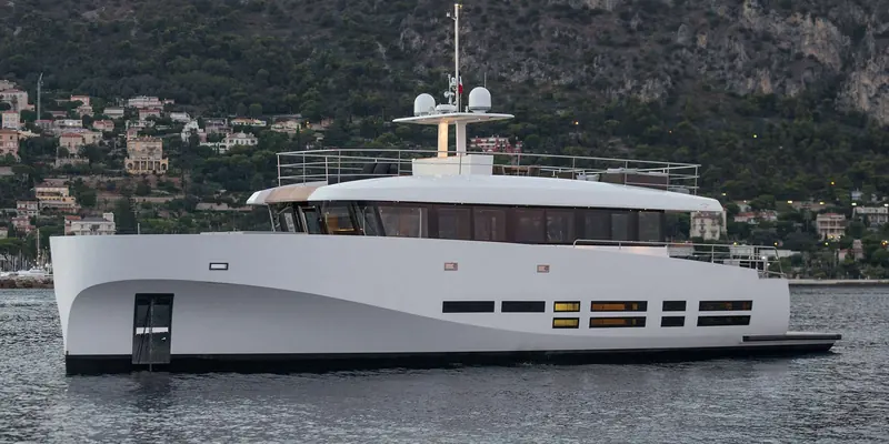 Casa, the 2016 Wally 27.3m, underway off the Mallorca coast, her open transom deck and low freeboard reflecting the brand's open-air design philosophy.