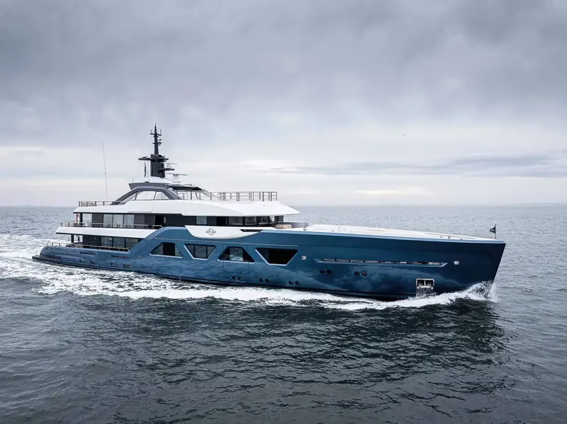 The sixth Amels 60 Limited Editions hull underway off the Dutch coast in her dark blue livery, one of several colour schemes owners have chosen across the series.