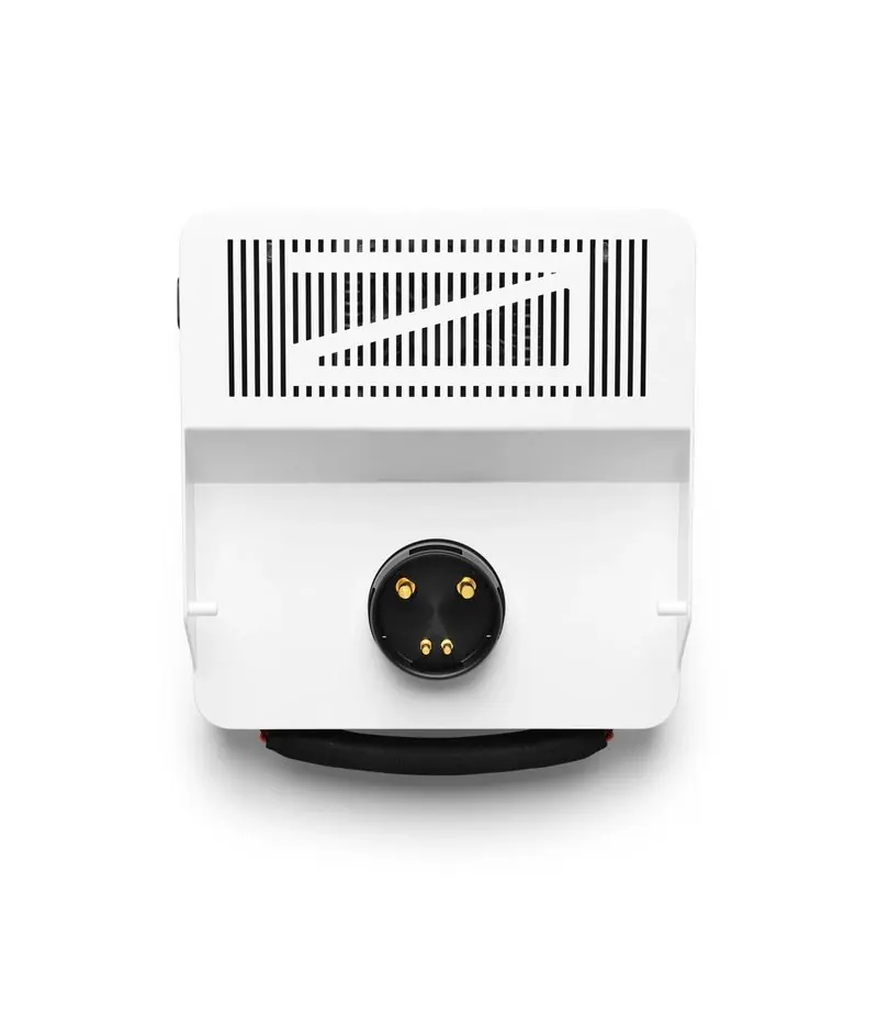Seen from above, the battery charger shows its vented top and four pin connector.