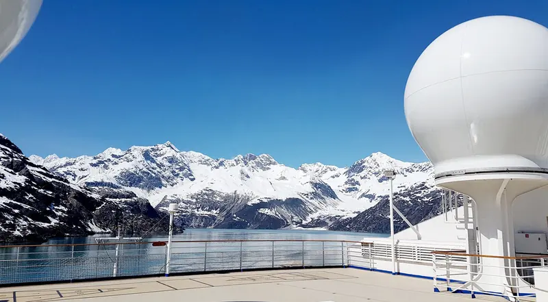 A 2.4-metre Intellian v240MT dome on a vessel's upper deck in Glacier Bay, Alaska, the large-VSAT class Intellian builds for cruise ships and the biggest superyachts.