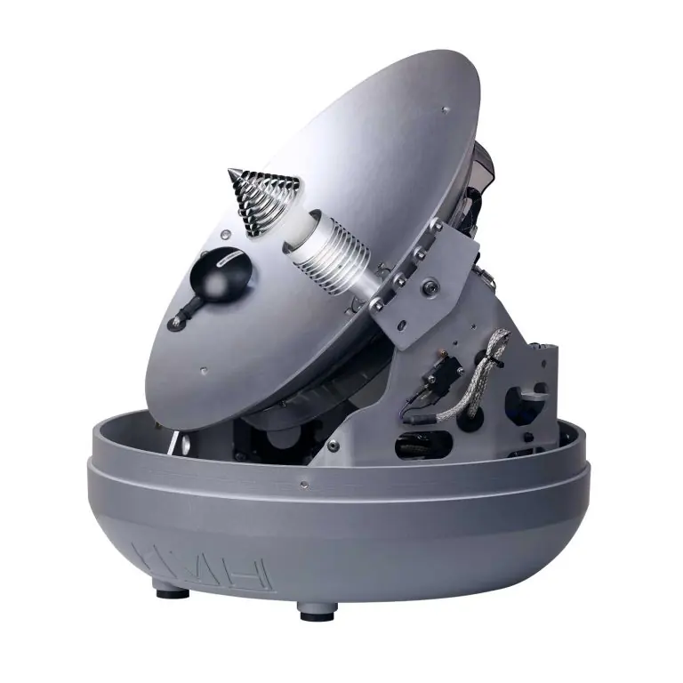 A TracPhone V30 with its dome removed, showing the stabilised dish, feed horn and gimbal drive that keep the antenna locked on a satellite as the boat moves.
