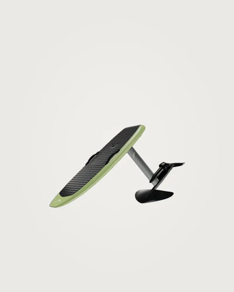 Carbon deck, green rails and a swept front wing show the foil rig against a plain background.