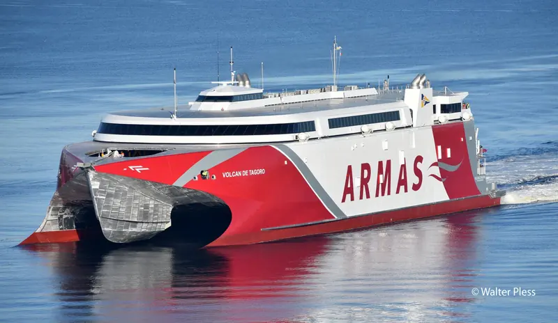 The Naviera Armas fast ferry Volcan de Tagoro under way off the Canary Islands, fitted with Naiad's Total Ride Control system for the underway pitch and roll control that keeps a planing hull level at speed.