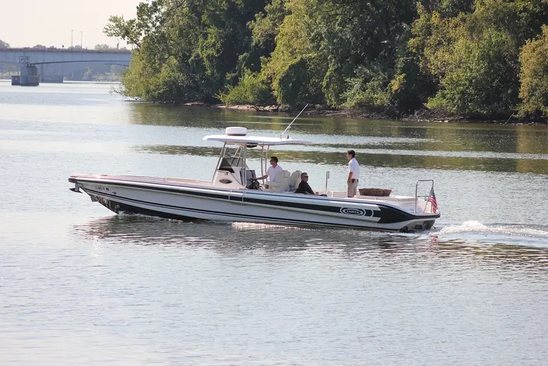 A Novurania Chase running on the Potomac off Georgetown Waterfront Park. The Chase badge sits on the topside aft, under the black flash that runs the length of the hull.