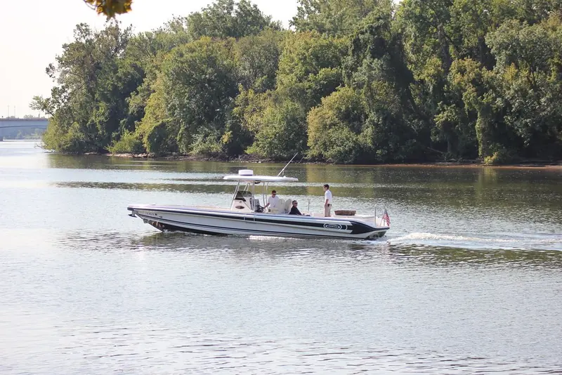 A Novurania Chase under way with three aboard. The long open cockpit aft of the console is the part of a tender an owner actually uses.