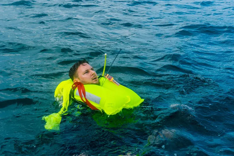 The rescueME MOB2, a personal AIS locator device meant to be worn on a lifejacket for a crew overboard alert.