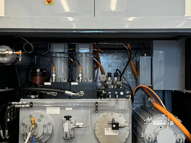 A Quantum hydraulic power unit wired into a vessel's machinery space, the pumps, accumulator and control valves that actually drive the fins.