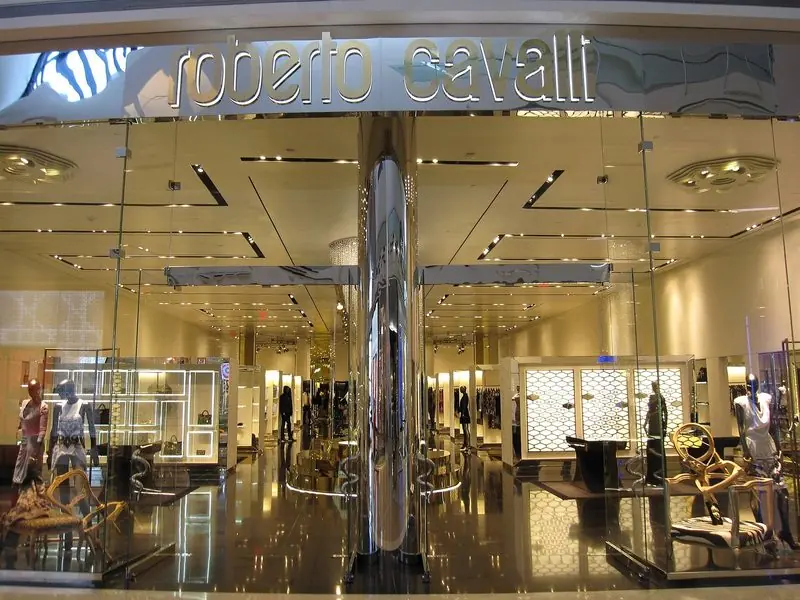 Mirrored columns and gilded chairs fill the Roberto Cavalli store entrance inside a Las Vegas mall.