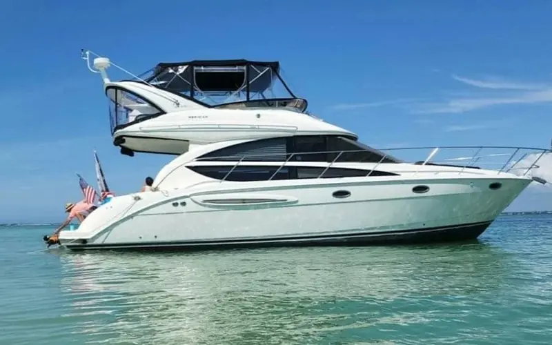 A Meridian motor yacht at anchor. Brunswick's Meridian line fitted Side-Power (then still branded Side-Power, now Sleipner) bow and stern thrusters as standard from 2002 until the model was discontinued, one of the OEM relationships behind the brand's leisure-boat volume.