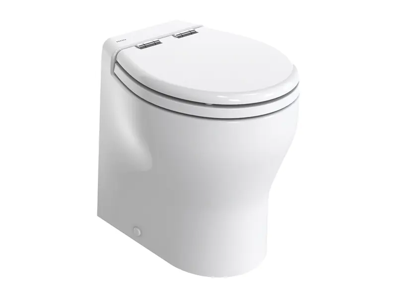 A Tecma Silence Plus toilet in white, its low-profile lid closed over a china bowl narrower than a household fixture, sized for a boat's head compartment