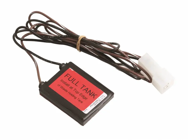A Tecma waste tank level sensor, a small black potted module labelled FULL TANK with a coiled pair of brown sense wires and a white wiring connector, meant to be fixed at the top edge of the holding tank