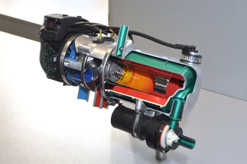 A second angle of the cutaway Th 90 S hydronic heater unit showing the burner assembly and coolant jacket