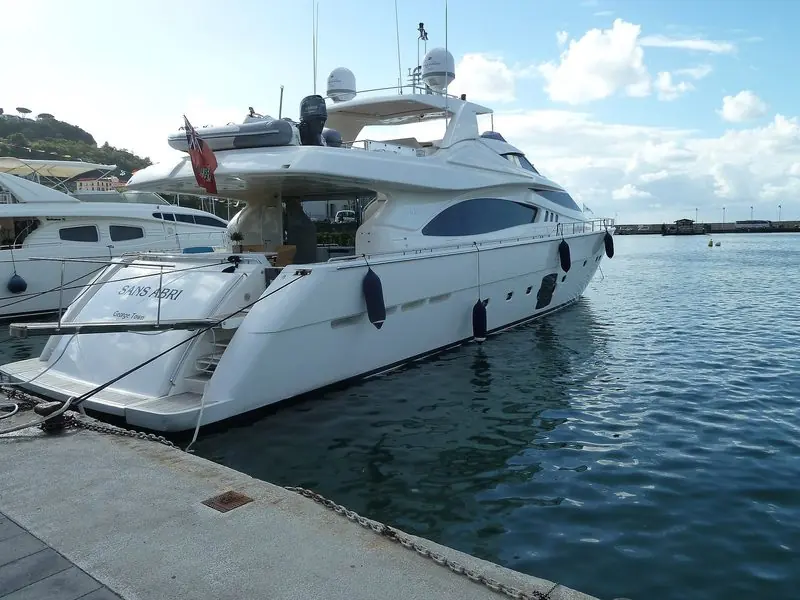 Flybridge motor yacht Sans Abri berthed at Casamicciola harbour on Ischia