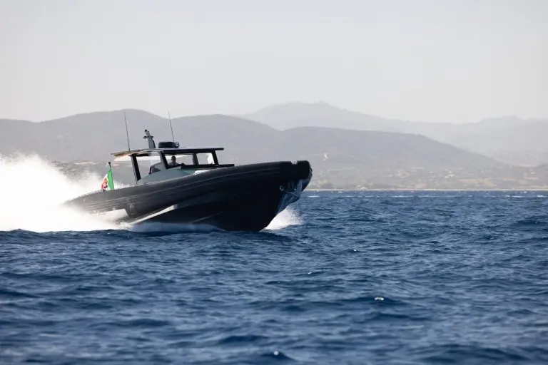At anchor off the Italian coast. The BS 260 is built to the same open, walk-around deck layout scaled up to three guest cabins.