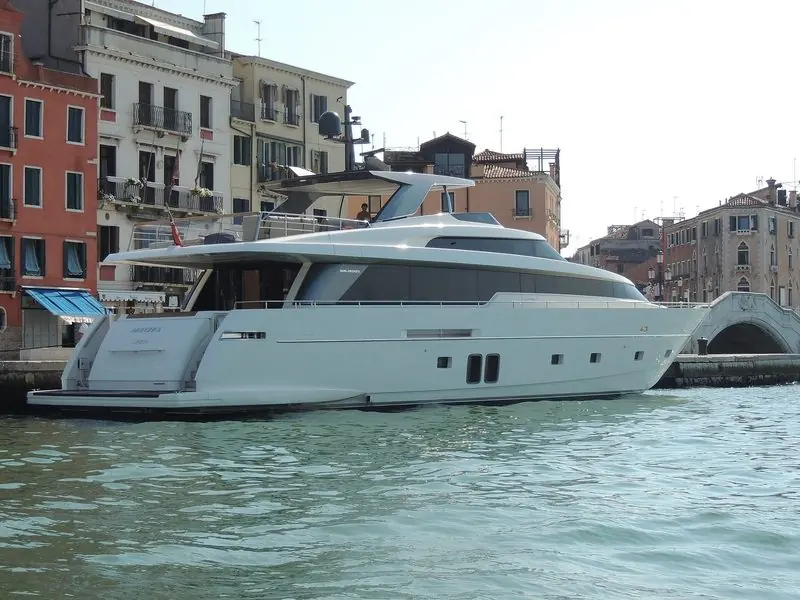 Alongside in Venice, a flybridge Sanlorenzo sits below the palazzo windows.